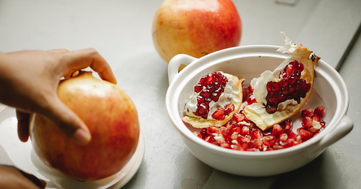 Does bleaching or milling flour remove vitamins? - Crop person with ripe pomegranate in hand Does bleaching or milling flour remove vitamins? - Crop person with ripe pomegranate in hand