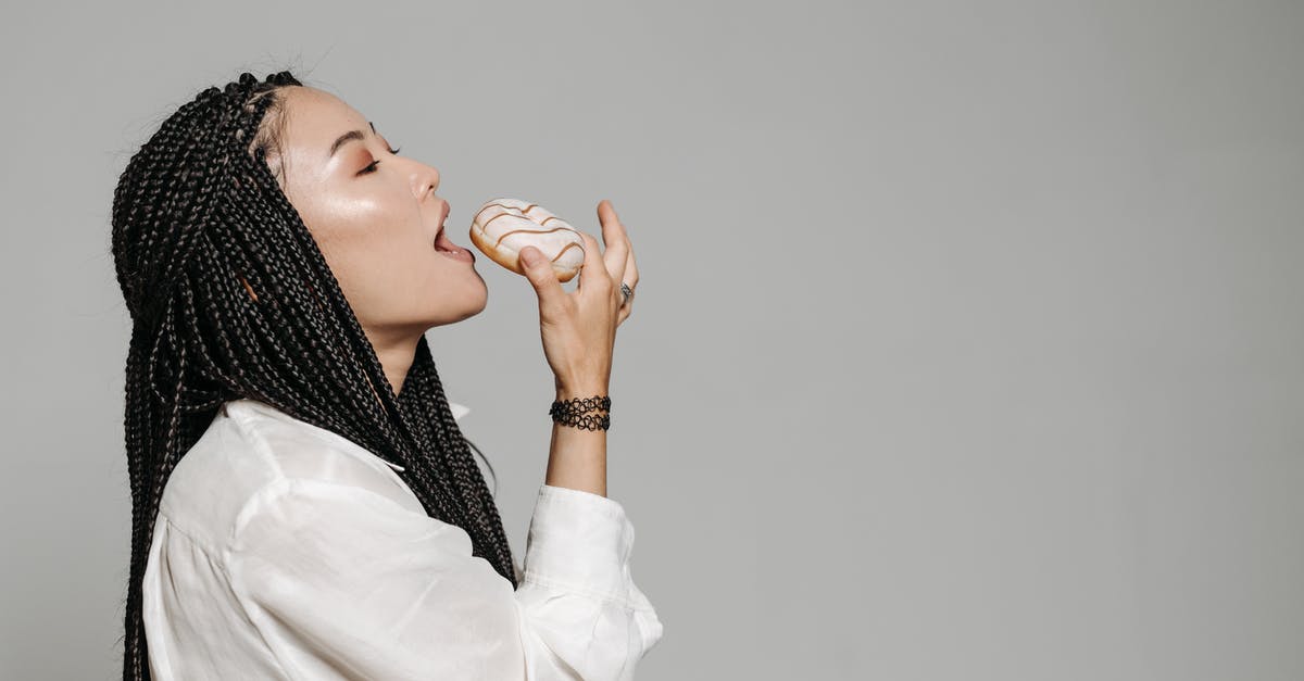 Does eating foods made using transglutaminase pose any risk to your health? [closed] - Woman in White Long Sleeve Shirt Covering Her Mouth With Her Hand