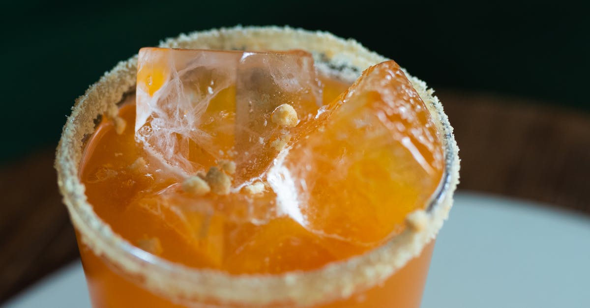 Does fruitcake made with alcohol stay alcoholic after aging? - Orange Juice in Clear Drinking Glass Does fruitcake made with alcohol stay alcoholic after aging? - Orange Juice in Clear Drinking Glass