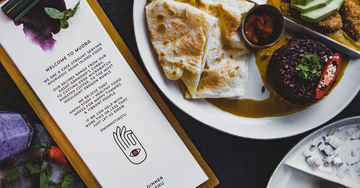 Does ingredient order matter when making Yorkshire Puddings? - Asian island food on plate placed on table with welcome page of cafe menu Does ingredient order matter when making Yorkshire Puddings? - Asian island food on plate placed on table with welcome page of cafe menu