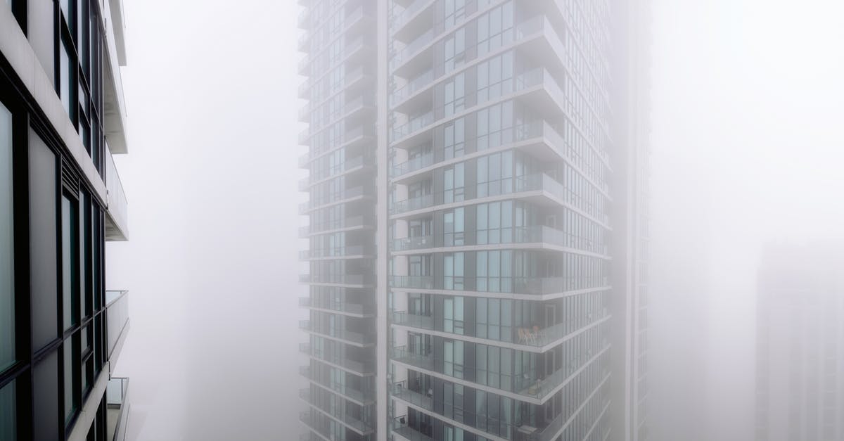 Does invisible mould exist? - Contemporary residential building with balconies covered with thick fog located on street of modern city with houses in overcast weather Does invisible mould exist? - Contemporary residential building with balconies covered with thick fog located on street of modern city with houses in overcast weather