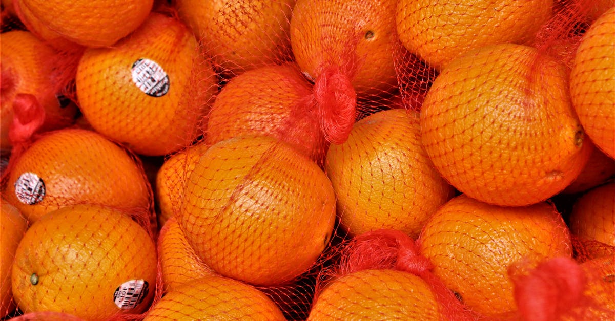 Does it harm juice if I store it in sub-zero temperatures? - Fresh bright mandarins with stickers in bag Does it harm juice if I store it in sub-zero temperatures? - Fresh bright mandarins with stickers in bag