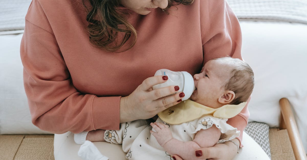 Does milk tenderize meat? - Mother feeding crying cute baby