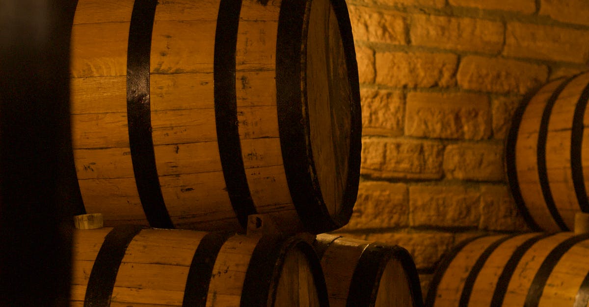 Does oak aged wine contain vanillin? - Stack of wine barrels in cellar Does oak aged wine contain vanillin? - Stack of wine barrels in cellar