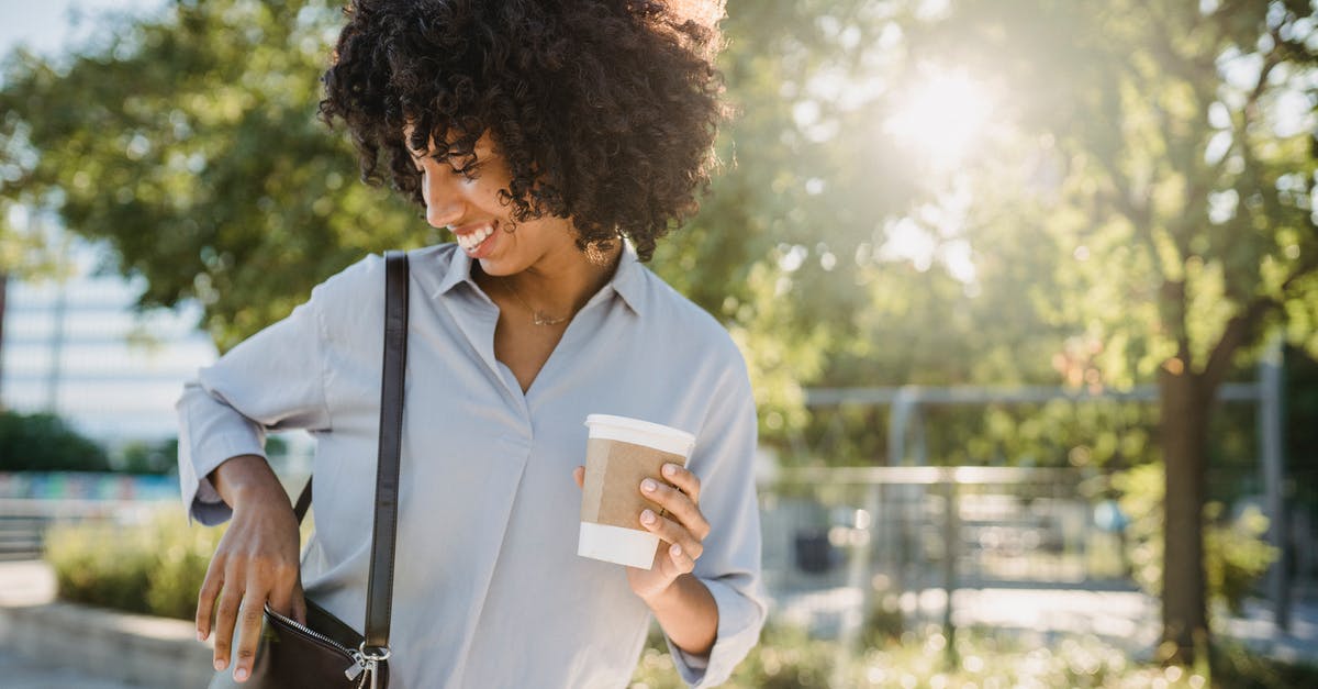 Does putting salt in coffee really remove bitterness? - Photograph of a Woman Putting Something in Her Purse Does putting salt in coffee really remove bitterness? - Photograph of a Woman Putting Something in Her Purse