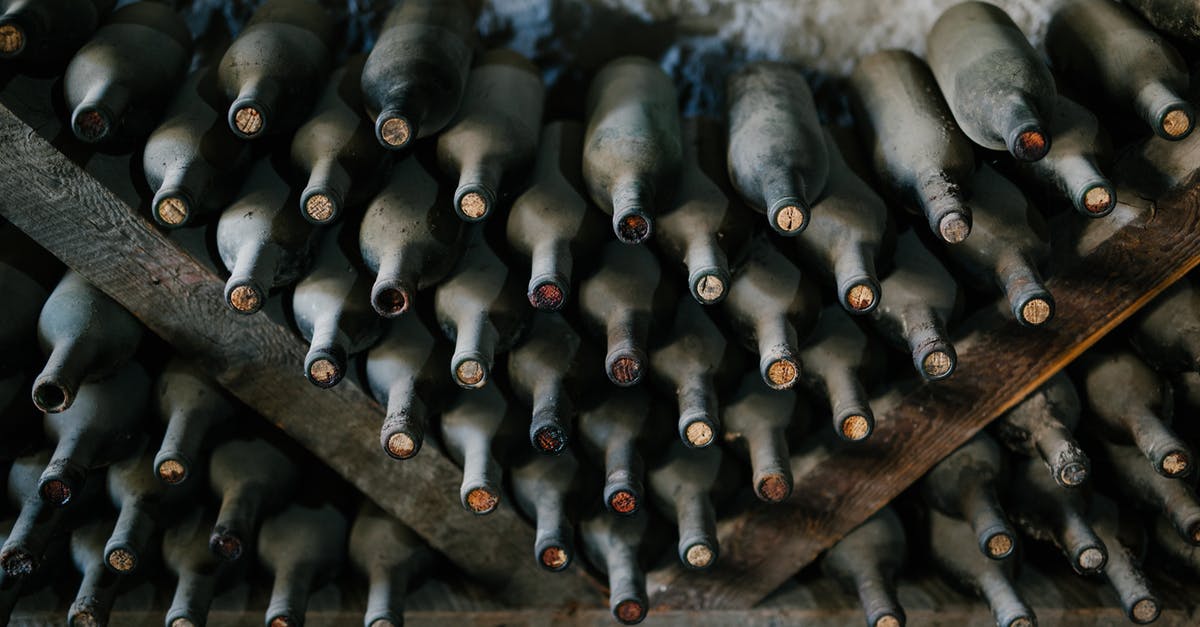 Does sauteing onions produce alcohol or something similar to alcohol? - From above of dusty bottles of alcohol drink placed above each other in rows in winery Does sauteing onions produce alcohol or something similar to alcohol? - From above of dusty bottles of alcohol drink placed above each other in rows in winery