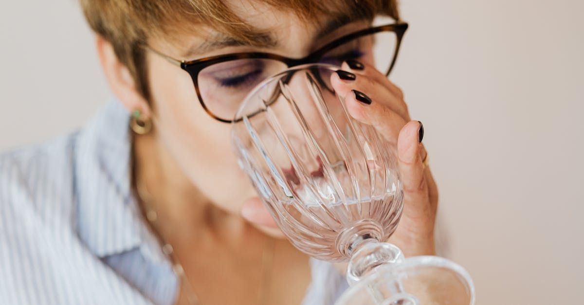 Does soaking liver in water instead of milk work well? - Crop woman with eyewear drinking water Does soaking liver in water instead of milk work well? - Crop woman with eyewear drinking water
