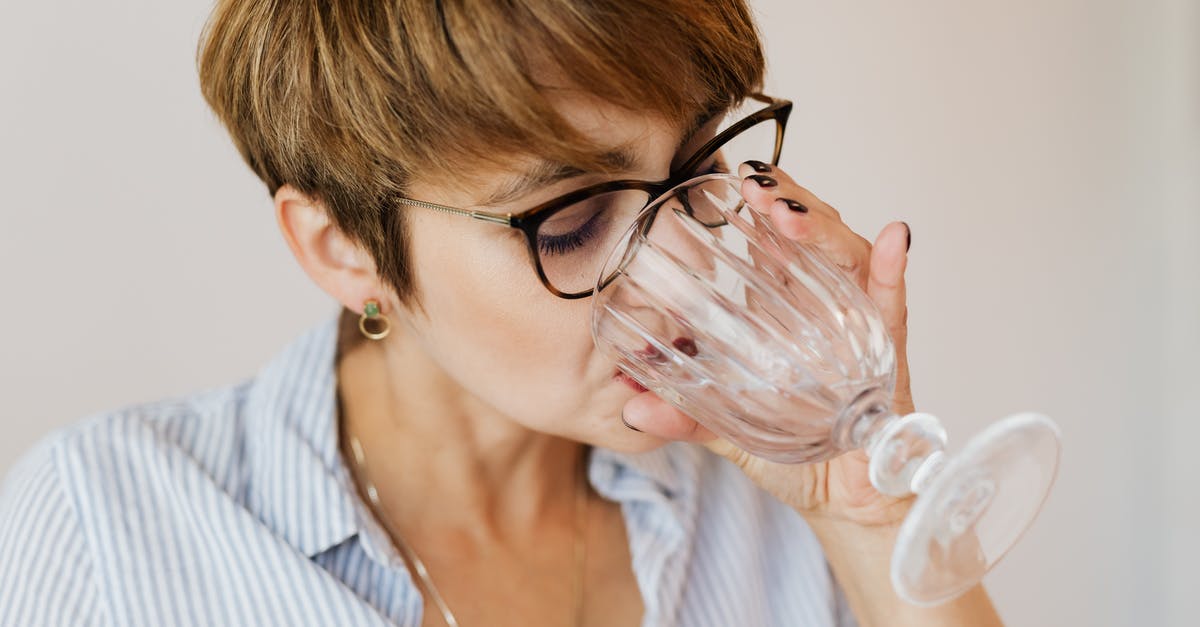 Does soaking liver in water instead of milk work well? - Crop serious female with short hair in shirt with stripes and glasses drinking water while sitting in creative workplace Does soaking liver in water instead of milk work well? - Crop serious female with short hair in shirt with stripes and glasses drinking water while sitting in creative workplace