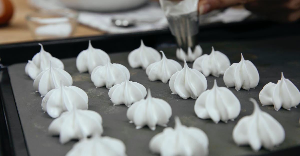Does Sugar Cook Eggs? - Crop unrecognizable chef with piping bag with star tip forming vanilla meringue cookies on baking pan in kitchen Does Sugar Cook Eggs? - Crop unrecognizable chef with piping bag with star tip forming vanilla meringue cookies on baking pan in kitchen