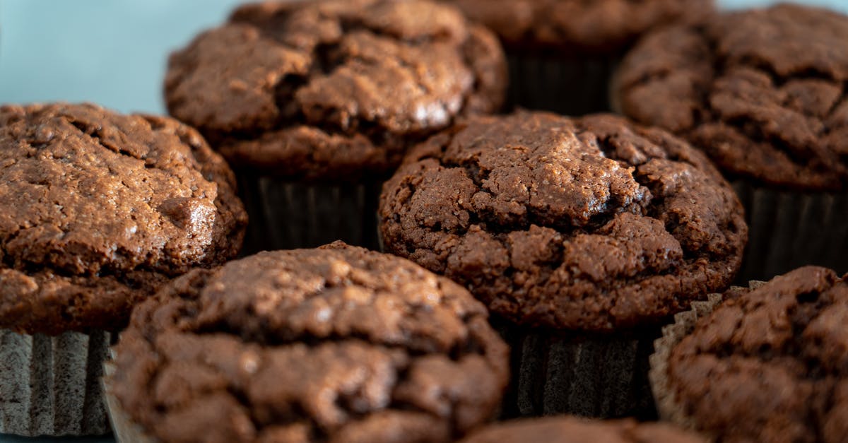 Does Sugar Cook Eggs? - Chocolate Cupcakes In Close-up View Does Sugar Cook Eggs? - Chocolate Cupcakes In Close-up View