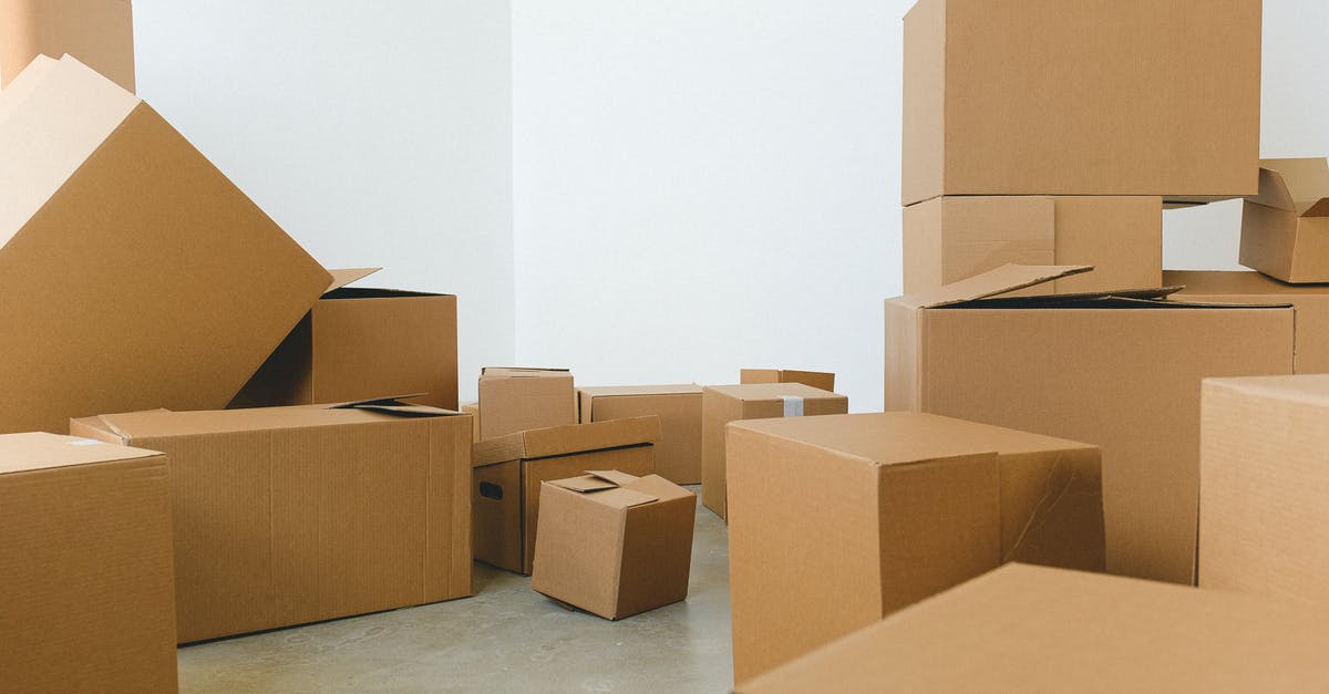 Does the size of capers influence their taste? - Stack of carton boxes of various shapes and sizes scattered in floor near white walls during relocation Does the size of capers influence their taste? - Stack of carton boxes of various shapes and sizes scattered in floor near white walls during relocation
