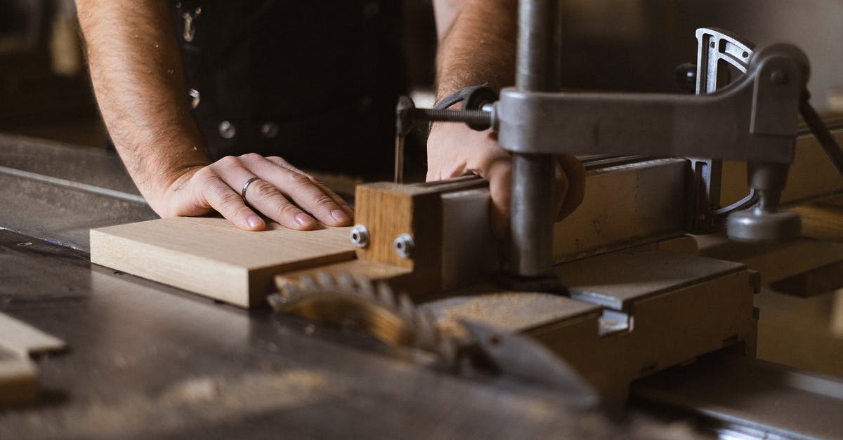 Does the snake method only work on circular grills? - Unrecognizable male master cutting piece of wooden plank while working at sawbench in workshop on blurred background with professional equipment Does the snake method only work on circular grills? - Unrecognizable male master cutting piece of wooden plank while working at sawbench in workshop on blurred background with professional equipment