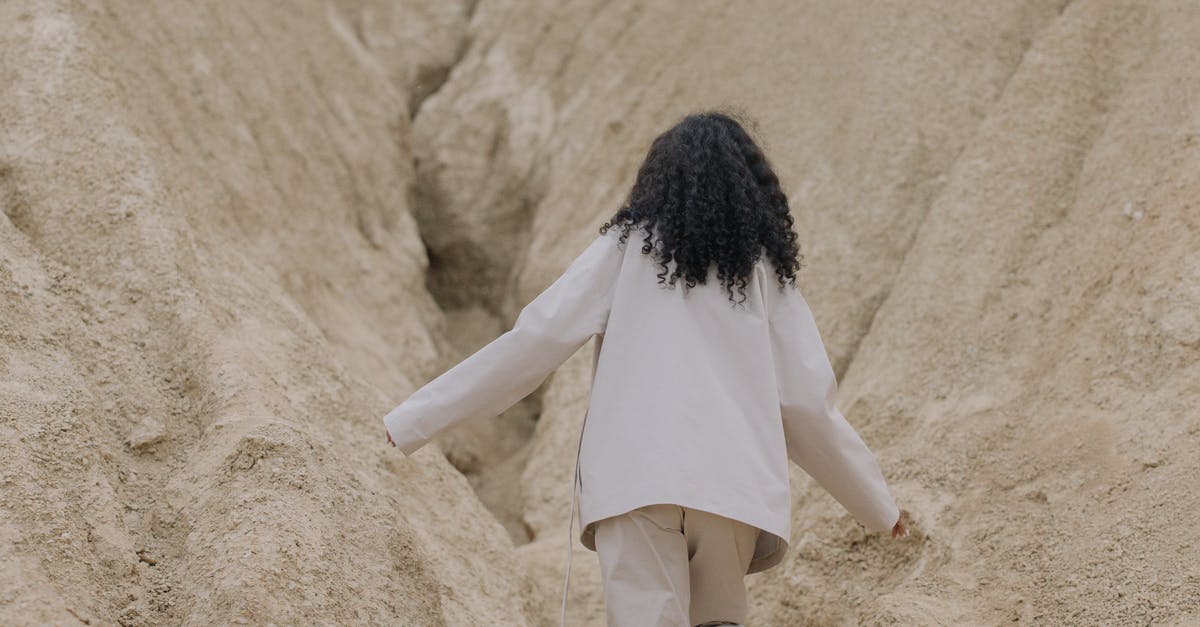 Does there exist a conversion between a sourdough and preferments recipes? - Person in White Long Sleeve Shirt Walking Between Brown Rough Walls Does there exist a conversion between a sourdough and preferments recipes? - Person in White Long Sleeve Shirt Walking Between Brown Rough Walls