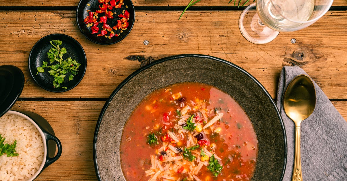Does using wild rice in soup suck up all the broth if it is held after cooking? - Black Ceramic Bowl With Soup Does using wild rice in soup suck up all the broth if it is held after cooking? - Black Ceramic Bowl With Soup