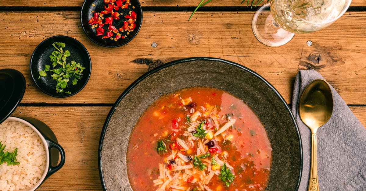 Does using wild rice in soup suck up all the broth if it is held after cooking? - Black Ceramic Bowl With Soup Does using wild rice in soup suck up all the broth if it is held after cooking? - Black Ceramic Bowl With Soup