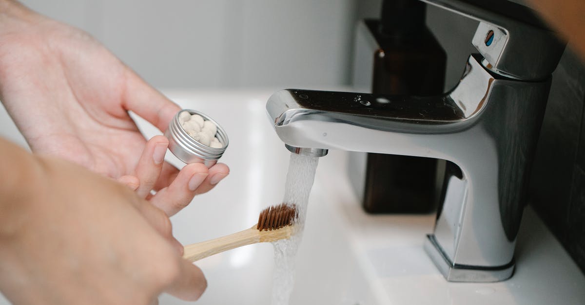 Does washing kimchi with water reduce the sodium content much? - Crop anonymous person with toothpaste tablets and ecological toothbrush under aqua flowing from washbasin tap in bathroom Does washing kimchi with water reduce the sodium content much? - Crop anonymous person with toothpaste tablets and ecological toothbrush under aqua flowing from washbasin tap in bathroom