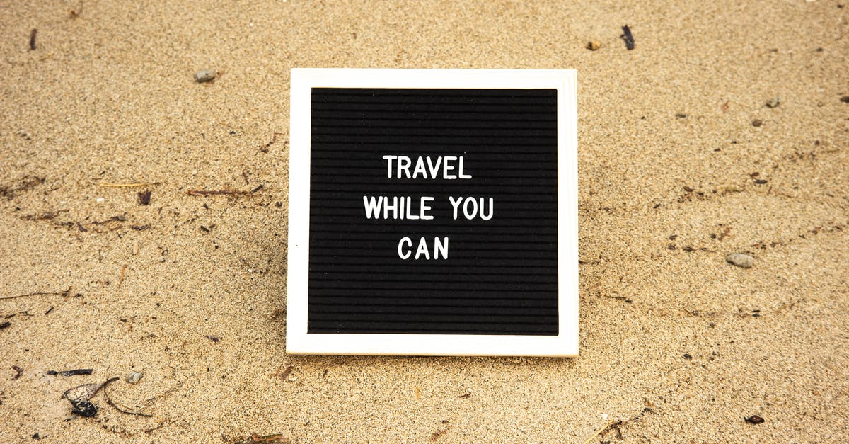 Does water "go bad" in this sense? - Board with Text 'Travel While You Can' on the Sand Does water "go bad" in this sense? - Board with Text 'Travel While You Can' on the Sand