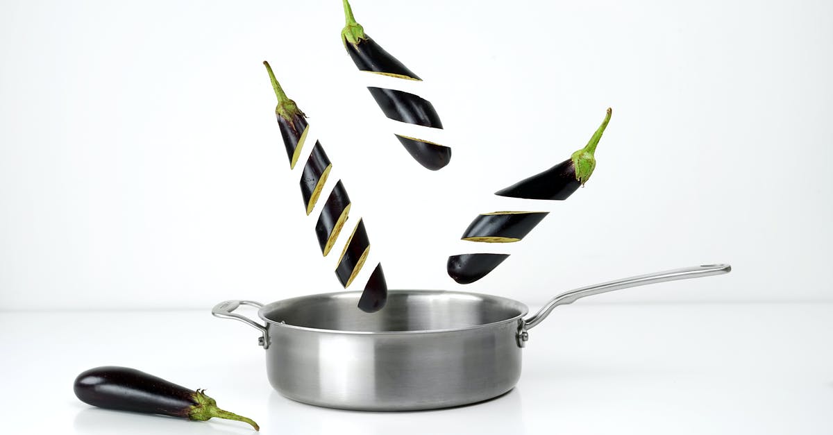 Dosa on clad stainless steel pan - Three Sliced Eggplants and Gray Stainless Steel Non-stick Pan Dosa on clad stainless steel pan - Three Sliced Eggplants and Gray Stainless Steel Non-stick Pan