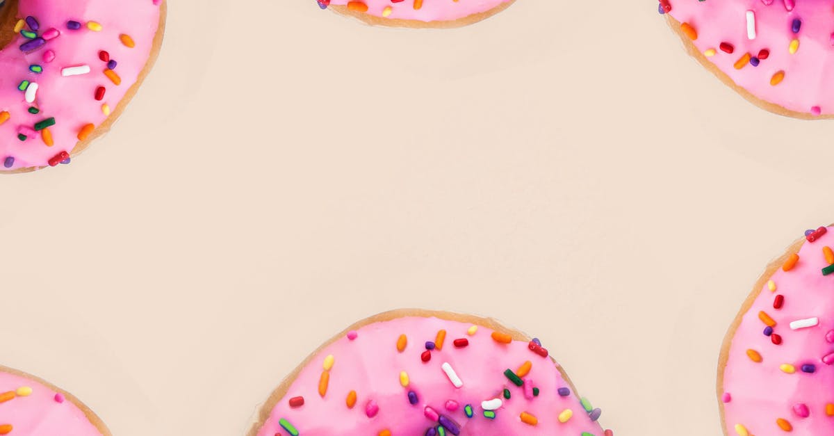 Doughnuts preseratives - Close-Up Photo of Pink Donuts