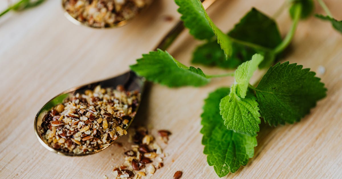 Drying of basil leaf and other herbs - Green Plant on White Wooden Table Drying of basil leaf and other herbs - Green Plant on White Wooden Table