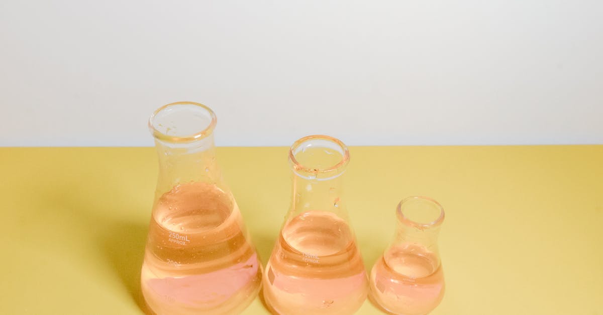 Egg sizes of yesteryear and today - Clear Glass Bottles on White Surface Egg sizes of yesteryear and today - Clear Glass Bottles on White Surface