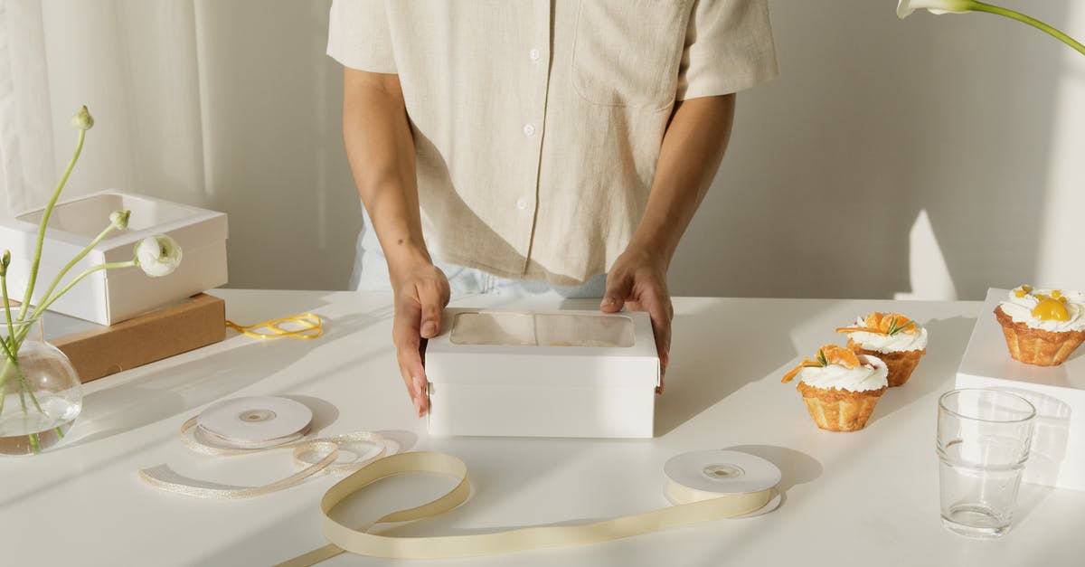 Estimating sugar & cream for a coffee service - Person in White Button Up Shirt Holding White Plastic Container