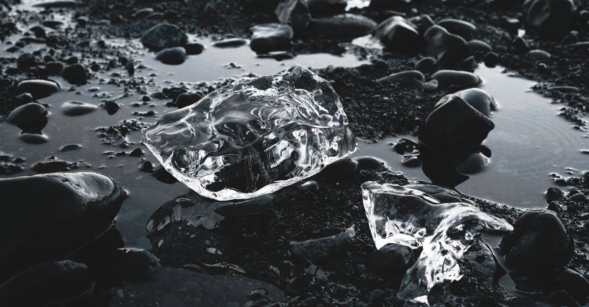 Extent of poultry denaturing via freezing(ice crystal formation)? - Pieces of ice on rocky ground with water Extent of poultry denaturing via freezing(ice crystal formation)? - Pieces of ice on rocky ground with water