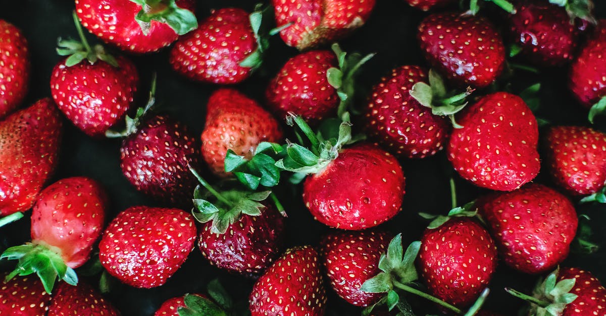 Extracting colour out of strawberries - Close-up Photo of Strawberries Extracting colour out of strawberries - Close-up Photo of Strawberries