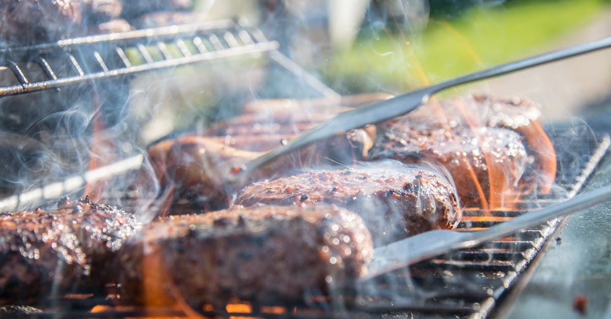 Extremely hard layer after cooking the burger on the grill - Close Photography of Grilled Meat on Griddle Extremely hard layer after cooking the burger on the grill - Close Photography of Grilled Meat on Griddle