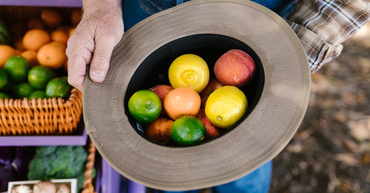 Farmer cheese turns out inconsistently - Person Holding a Hat With Fruits Farmer cheese turns out inconsistently - Person Holding a Hat With Fruits
