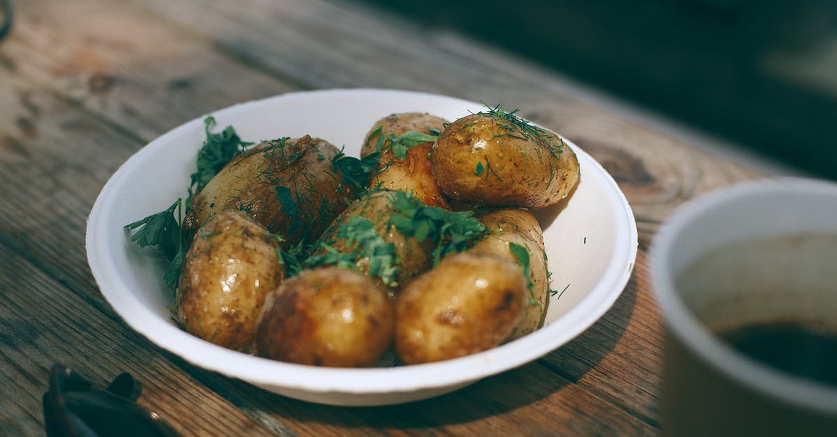 Fastest way to cook a baked potato? - Delicious baked potatoes with greenery Fastest way to cook a baked potato? - Delicious baked potatoes with greenery