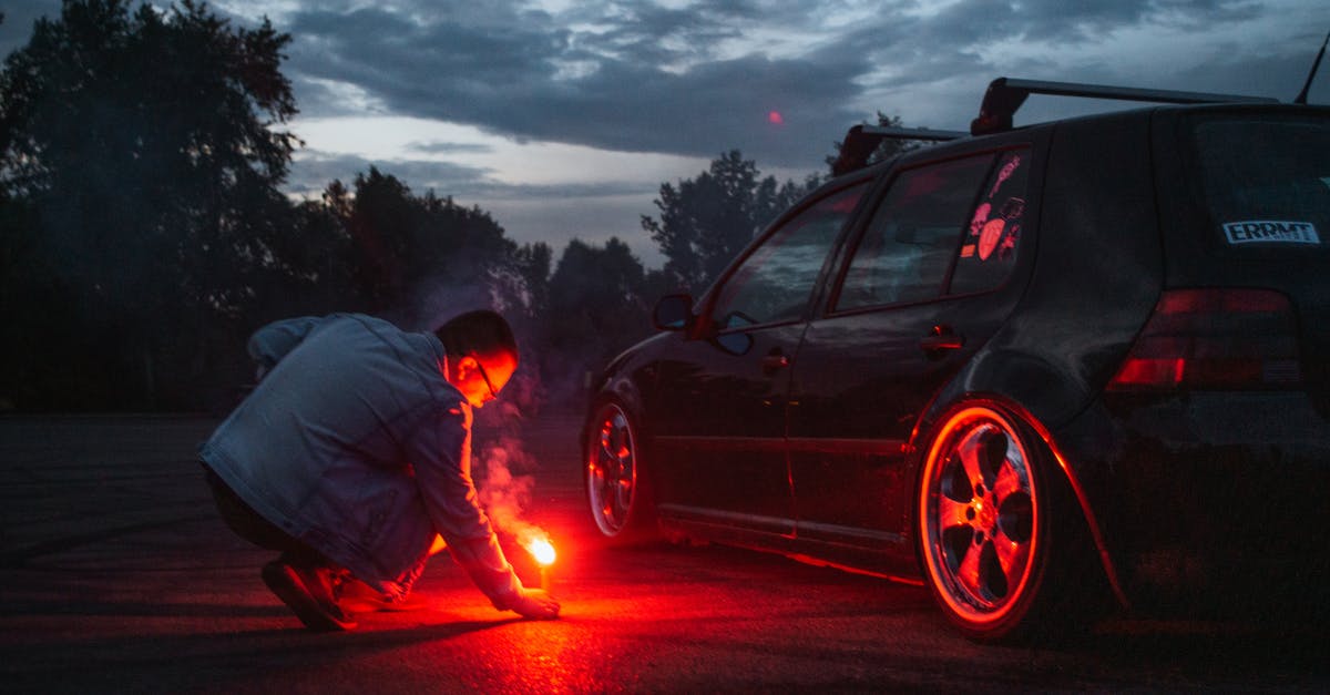 Fermenting by accident - Man in Gray Jacket Standing Beside Black Car during Night Time Fermenting by accident - Man in Gray Jacket Standing Beside Black Car during Night Time