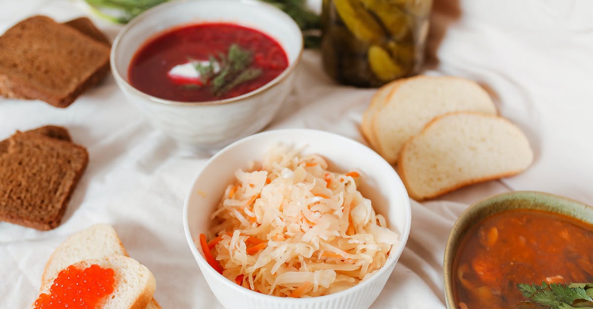 Fermenting Sauerkraut - Should I Stir? - A Delicious Bowls of Food with Slices of Breads and Salmon Roe Fermenting Sauerkraut - Should I Stir? - A Delicious Bowls of Food with Slices of Breads and Salmon Roe