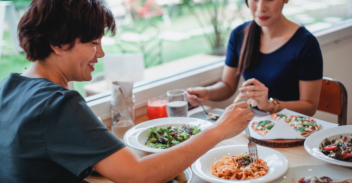 First time dashi doesn't taste much - Asian women having lunch in restaurant First time dashi doesn't taste much - Asian women having lunch in restaurant