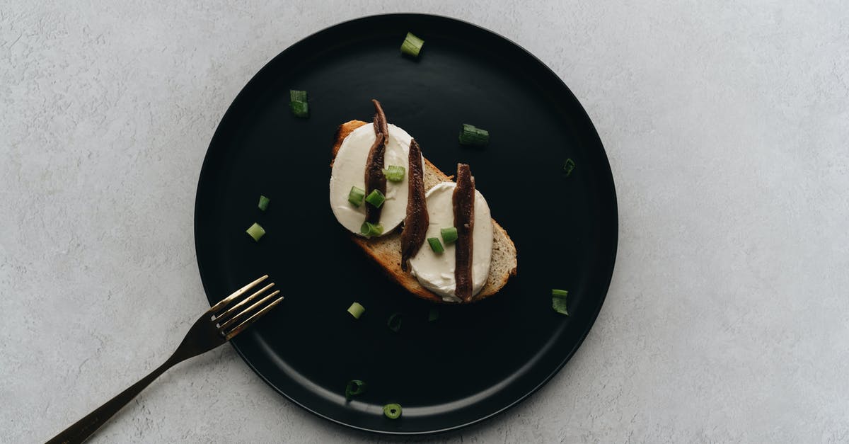 Fish and cheese: An unbreakable rule? - Bruschetta Dish on Black Pate Fish and cheese: An unbreakable rule? - Bruschetta Dish on Black Pate