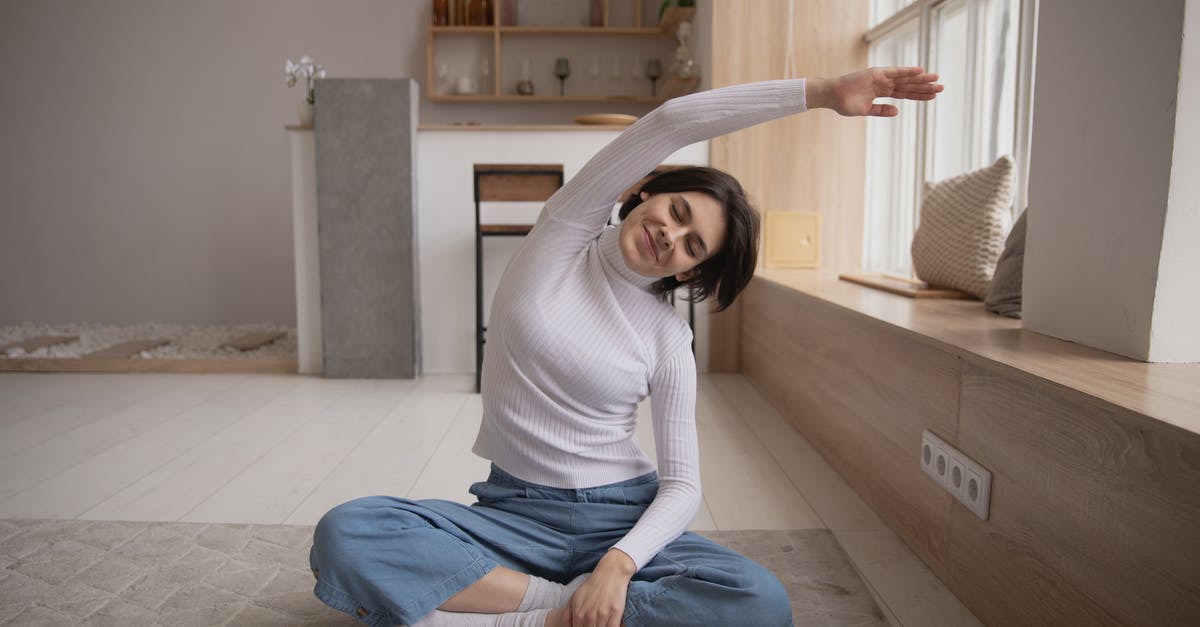 Flat griddle pan for Weber Spirit II E-320 BBQ - Smiling woman practicing yoga with closed eyes at home Flat griddle pan for Weber Spirit II E-320 BBQ - Smiling woman practicing yoga with closed eyes at home