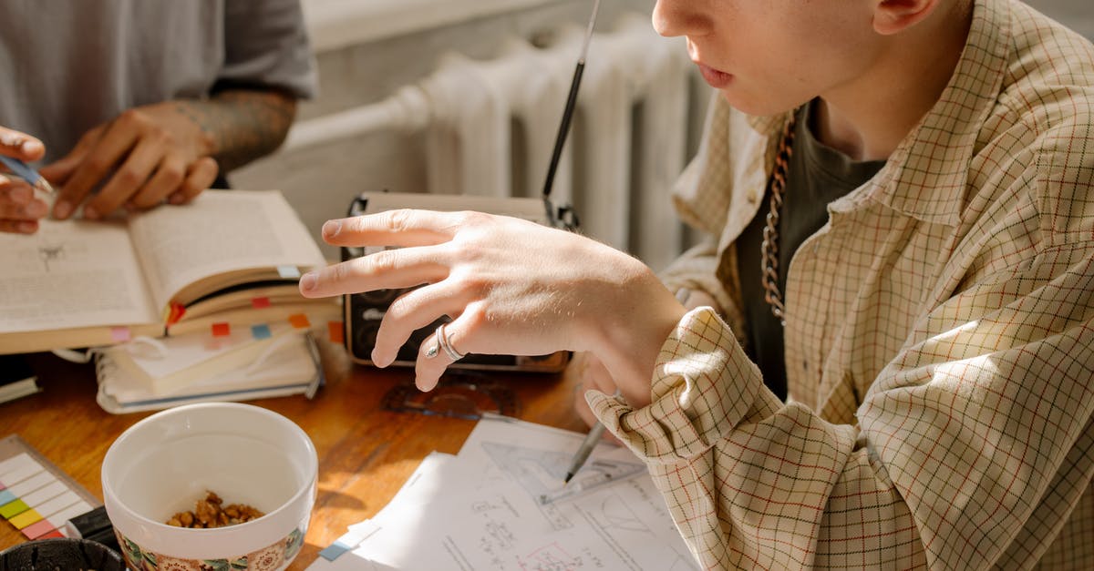 Flavor notes or profile of truffles? - Woman in Brown and White Plaid Long Sleeve Shirt Holding Smartphone Flavor notes or profile of truffles? - Woman in Brown and White Plaid Long Sleeve Shirt Holding Smartphone