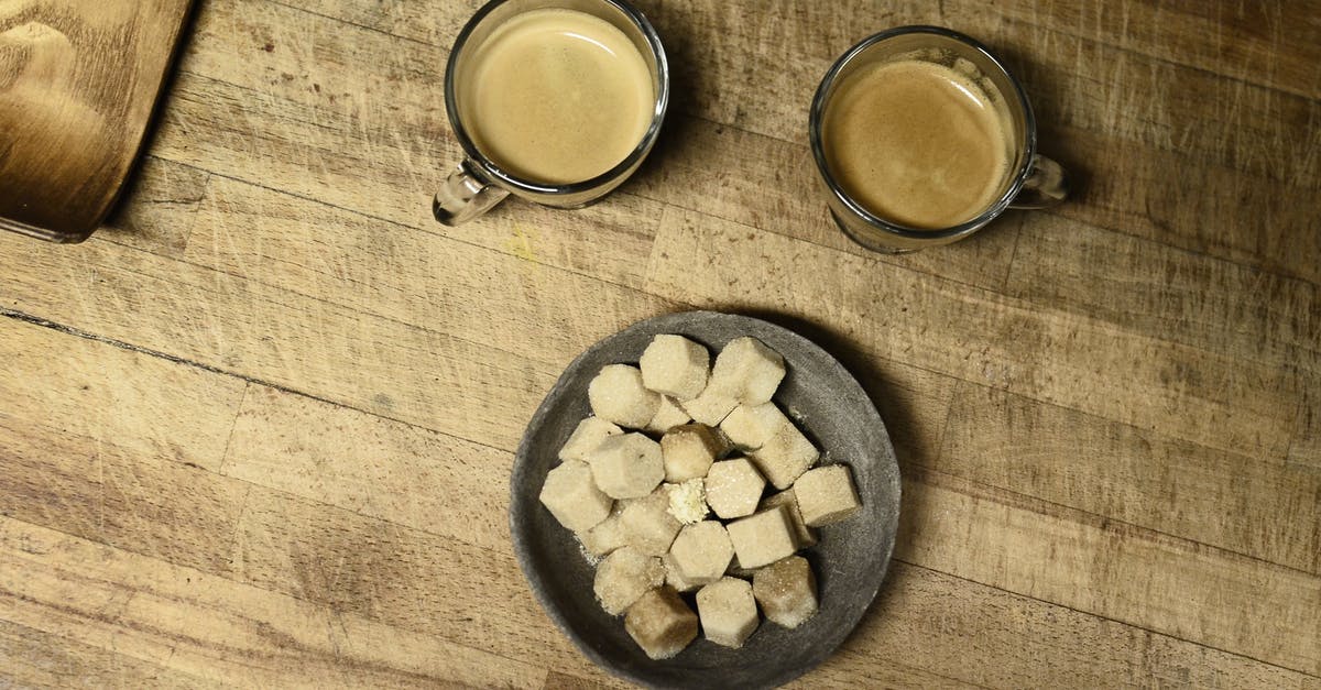 Flavour espresso with vanilla without adding sugar or other sweetener? - White and Brown Stones on Black Round Plate Flavour espresso with vanilla without adding sugar or other sweetener? - White and Brown Stones on Black Round Plate