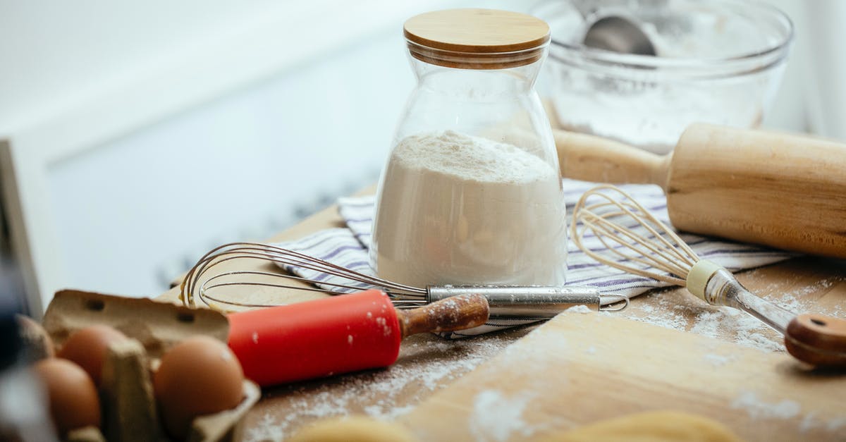Flour is many years expired but still looks good - Ingredients and kitchenware on table in daylight Flour is many years expired but still looks good - Ingredients and kitchenware on table in daylight