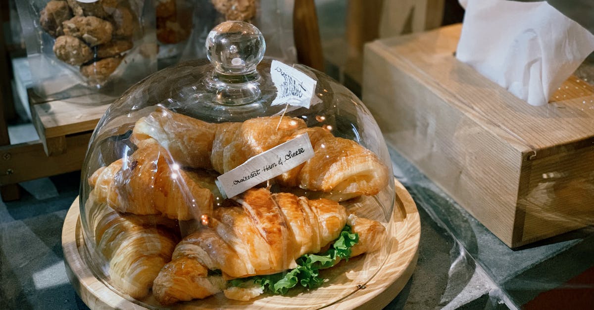 Freezing Bouchon Bakery Macarons. Whole cookie or just the halves? - Delicious croissants and cookies near tissue box in bakery