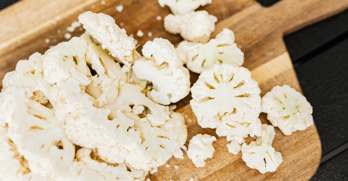 Freezing ready-cooked veg - White Flowers on Brown Wooden Chopping Board Freezing ready-cooked veg - White Flowers on Brown Wooden Chopping Board
