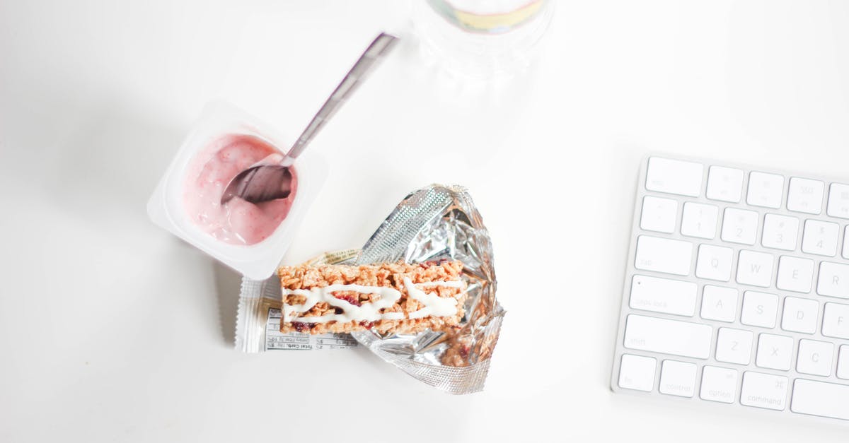 Frozen yogurt with inverted sugar - Flat Lay Photography of Yogurt With Pack of Crackers and Apple Magic Keyboard Frozen yogurt with inverted sugar - Flat Lay Photography of Yogurt With Pack of Crackers and Apple Magic Keyboard