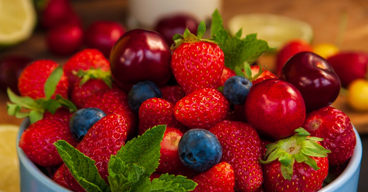 Fruit identification - Fruit bought in China - Strawberries on White Ceramic Bowl Fruit identification - Fruit bought in China - Strawberries on White Ceramic Bowl
