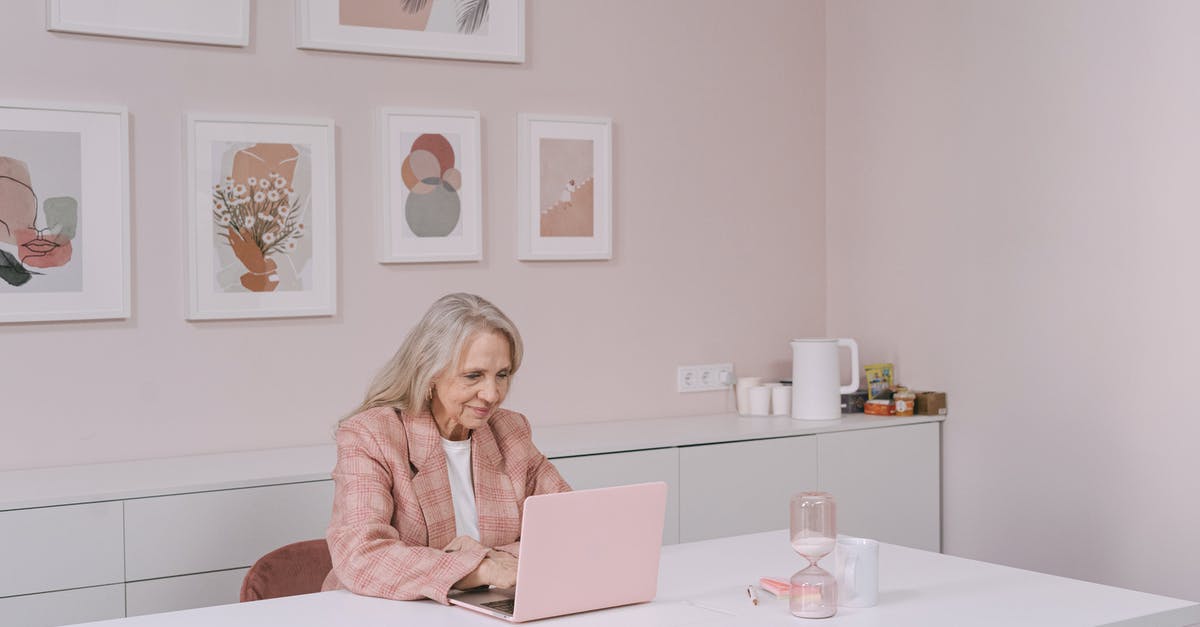 Frying Steak - disappointing gray crust, not pink inside - An Elderly Woman Using Her Laptop Frying Steak - disappointing gray crust, not pink inside - An Elderly Woman Using Her Laptop