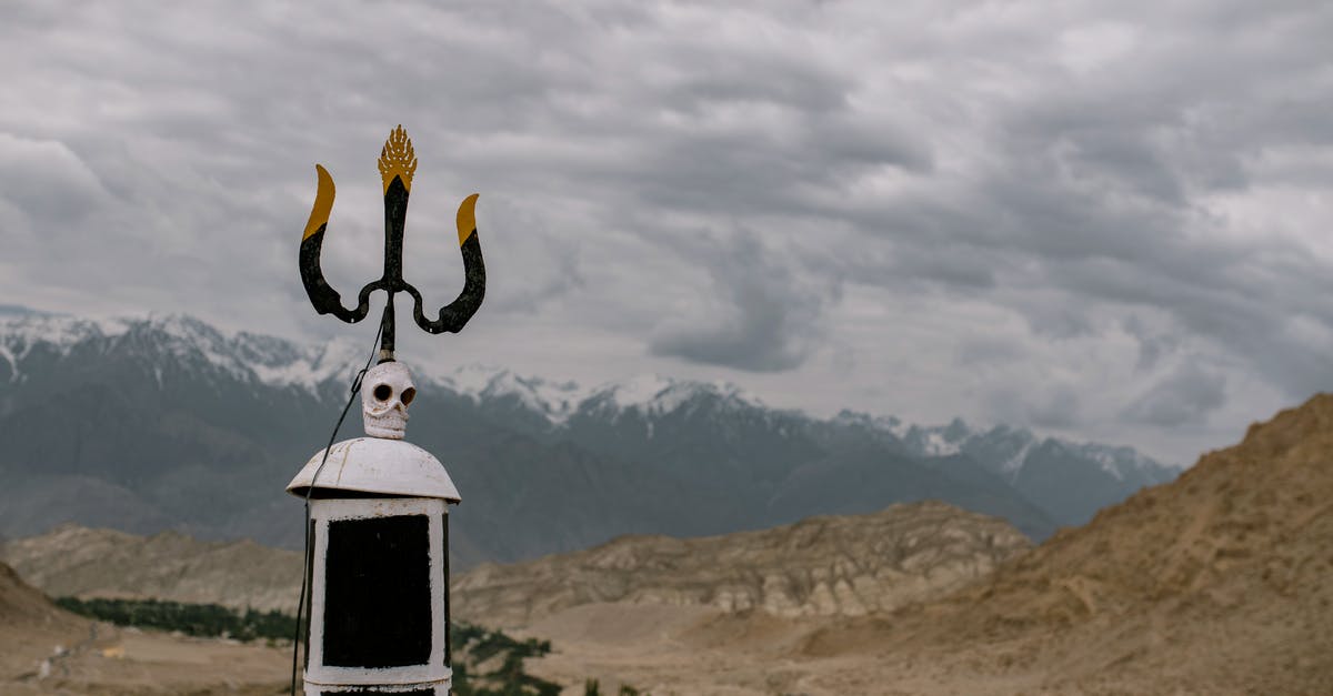 Furthering the dry aging process post purchase? - Old monument with Trident of Poseidon near mountains Furthering the dry aging process post purchase? - Old monument with Trident of Poseidon near mountains