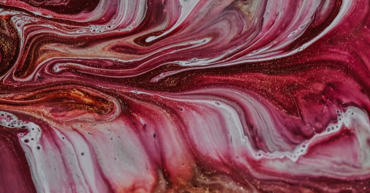 Garlic and oil emulsion - Colorful saturated background of mixed messy paints Garlic and oil emulsion - Colorful saturated background of mixed messy paints