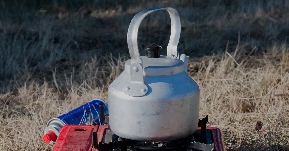 Gas Cooking Hob - A Kettle over a Portable Stove Gas Cooking Hob - A Kettle over a Portable Stove