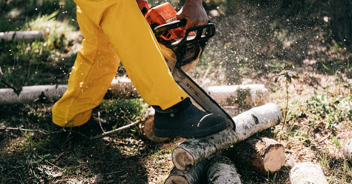 gas range hack for greater power output: does it work? - Lower body of crop unrecognizable woodcutter in yellow protective workwear cutting woods with powerful modern chainsaw while working in forest on sunny day gas range hack for greater power output: does it work? - Lower body of crop unrecognizable woodcutter in yellow protective workwear cutting woods with powerful modern chainsaw while working in forest on sunny day