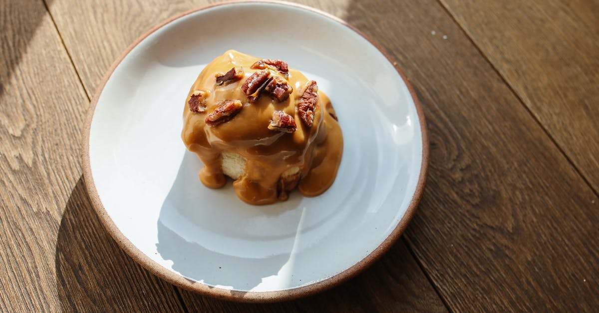 Georgian dessert based on walnuts - Brown Bread on White Ceramic Plate