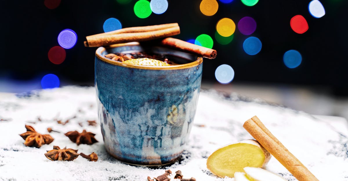 Ginger drink question - Ginger Tea With Cinnamon And Star Anise On Blue Ceramic Cup Ginger drink question - Ginger Tea With Cinnamon And Star Anise On Blue Ceramic Cup